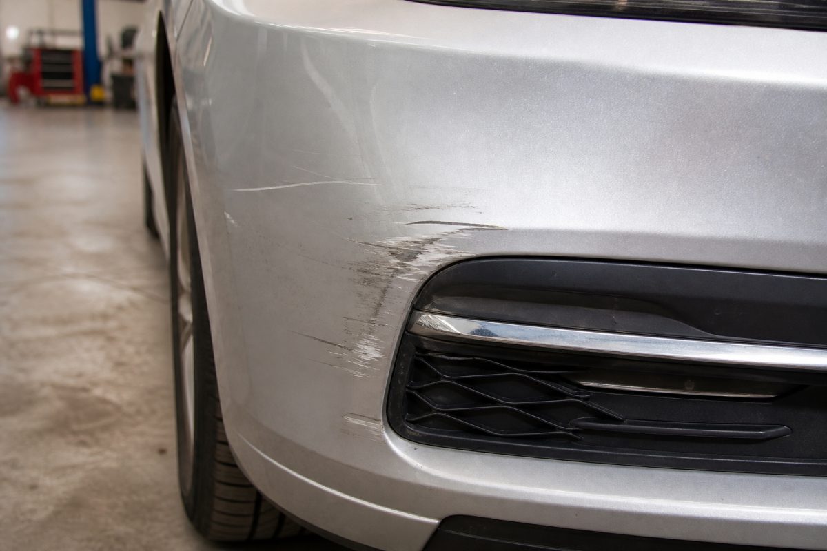 Customer phone photo of bumper damage ready for a remote quote